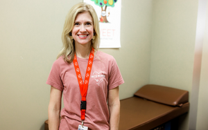  The school nurse in the clinic beside a clinic bed